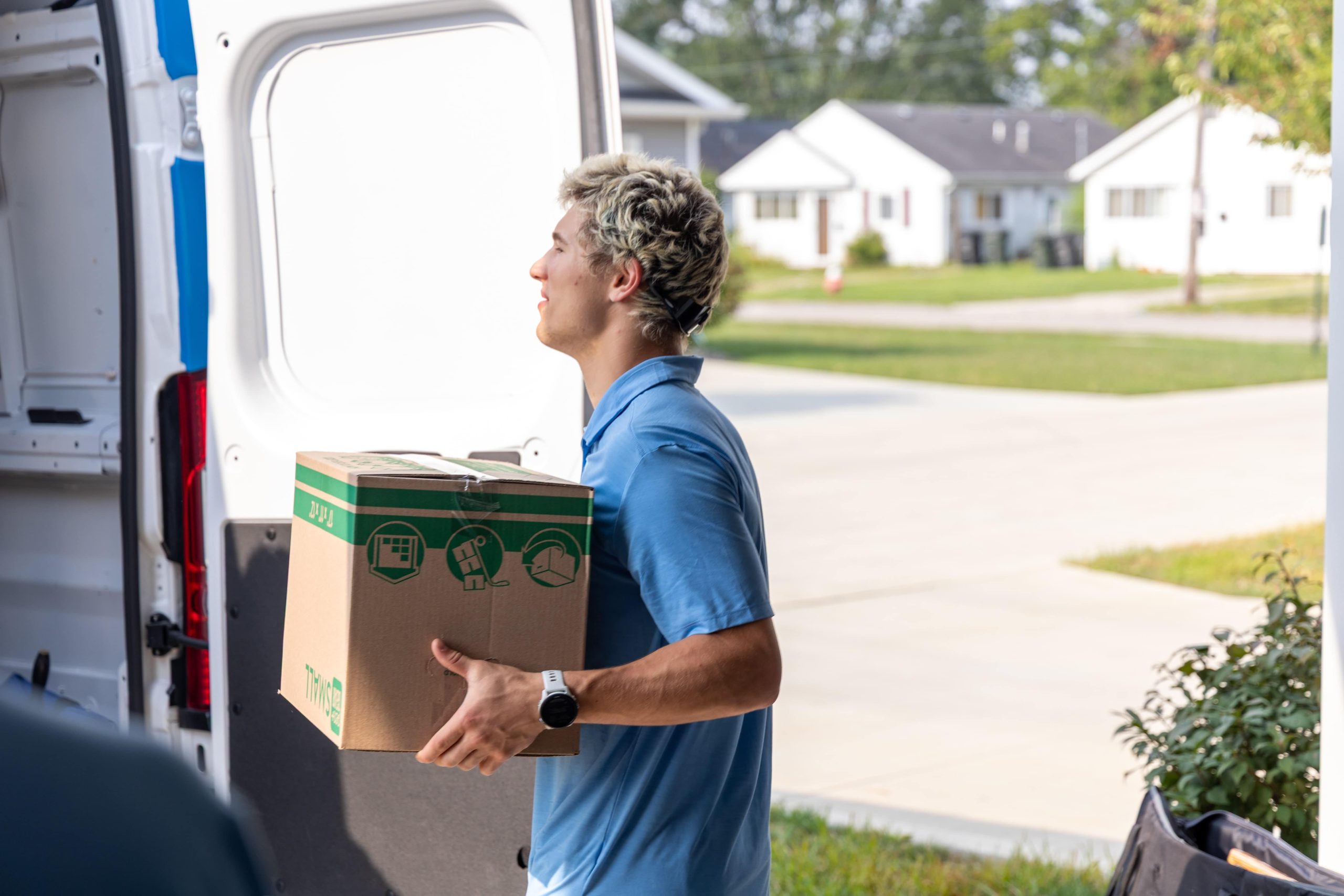 a man standing in front of a refrigerator