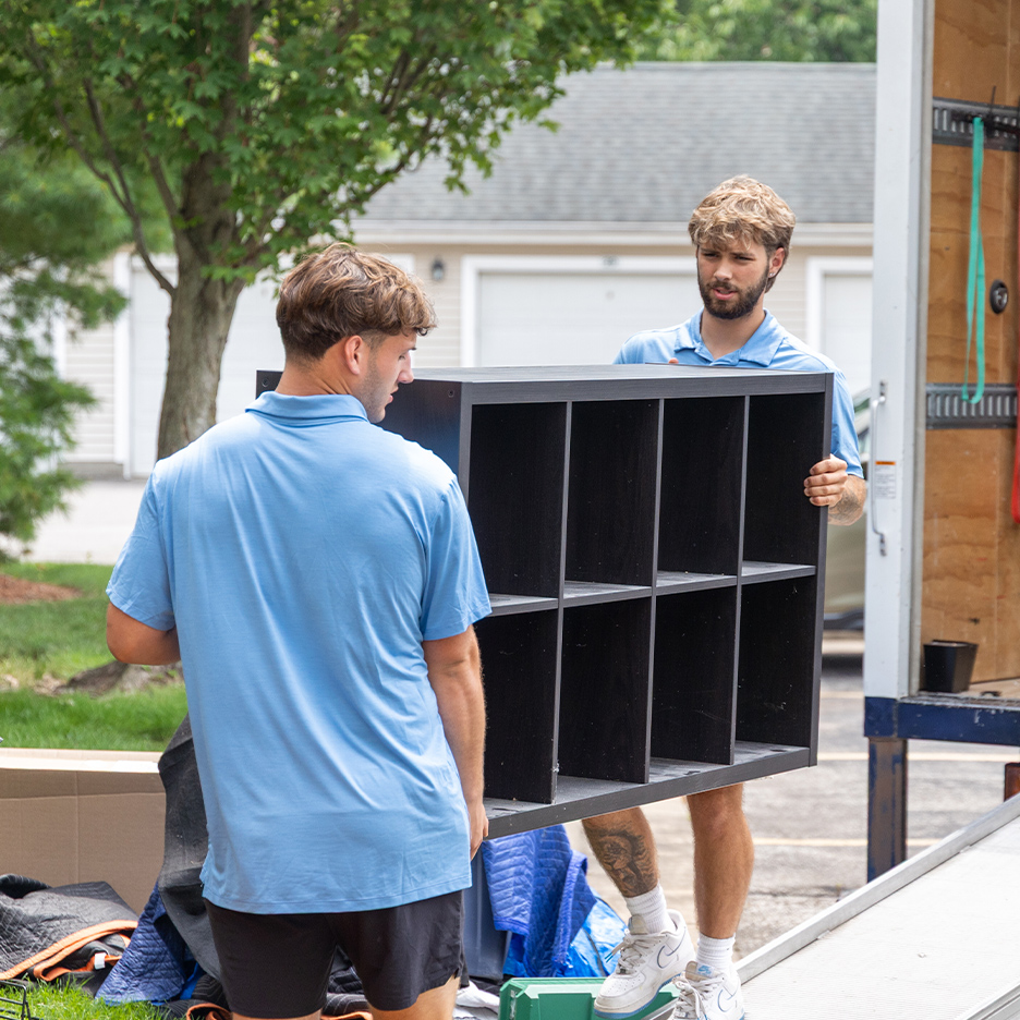a group of people standing outside of a building